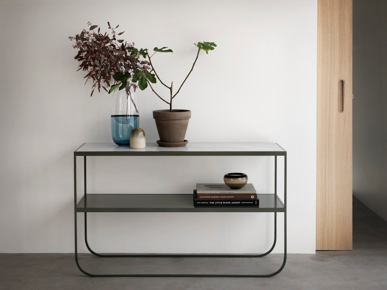 Designed by Broberg and Ridderstråle 2011.  Console table with a bent metal structure.