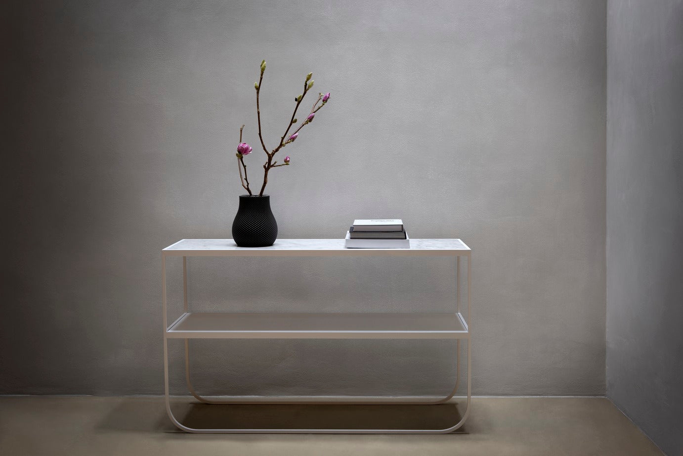 Designed by Broberg and Ridderstråle 2011.  Console table with a bent metal structure.