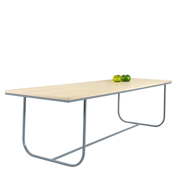 Designed by Broberg and Ridderstråle 2012.  Dining or work table with a frame in lacquered metal and a table top in selected oak veneer with an overhang of 29 cm on each short side.