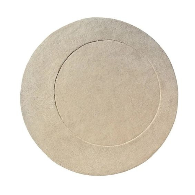 Designed by Claesson Koivisto Rune 1999.  Round hand-tufted rug with a hand-cut pattern.