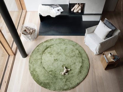 Designed by Claesson Koivisto Rune 1999.  Round hand-tufted rug with a hand-cut pattern.