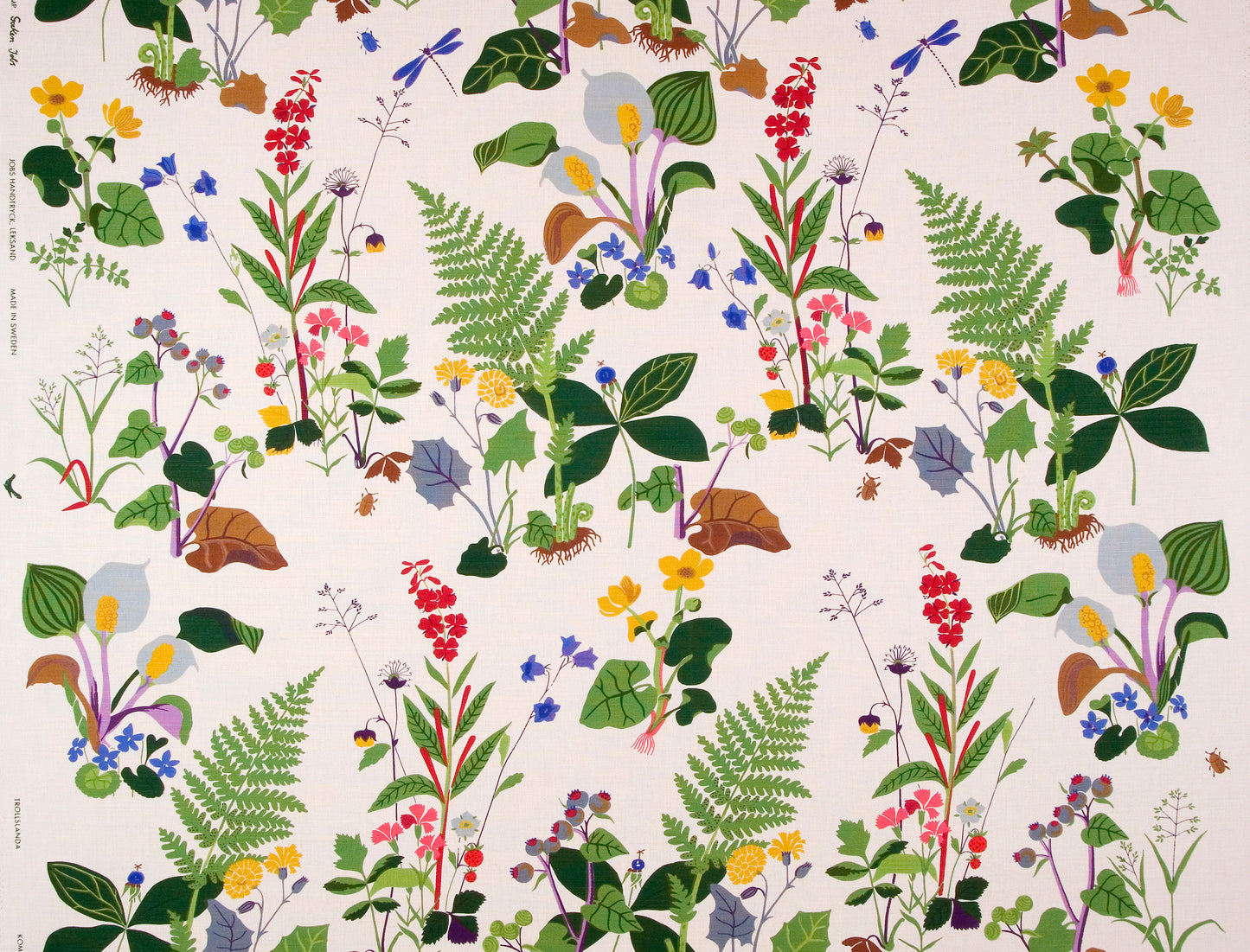 Designed by Gocken Jobs 1945 verdant plants and Swedish wildflowers bloom in the multi-colored fabric Trollslända that was first designed for NK (Nordiska Kompaniet) for a grand exhibition.