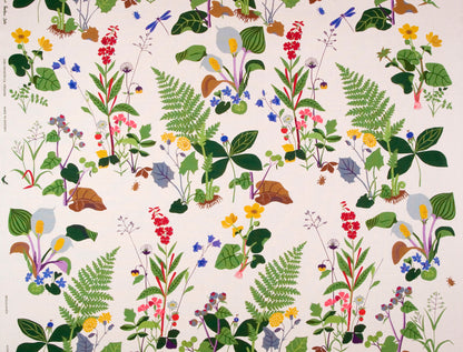 Designed by Gocken Jobs 1945 verdant plants and Swedish wildflowers bloom in the multi-colored fabric Trollslända that was first designed for NK (Nordiska Kompaniet) for a grand exhibition.